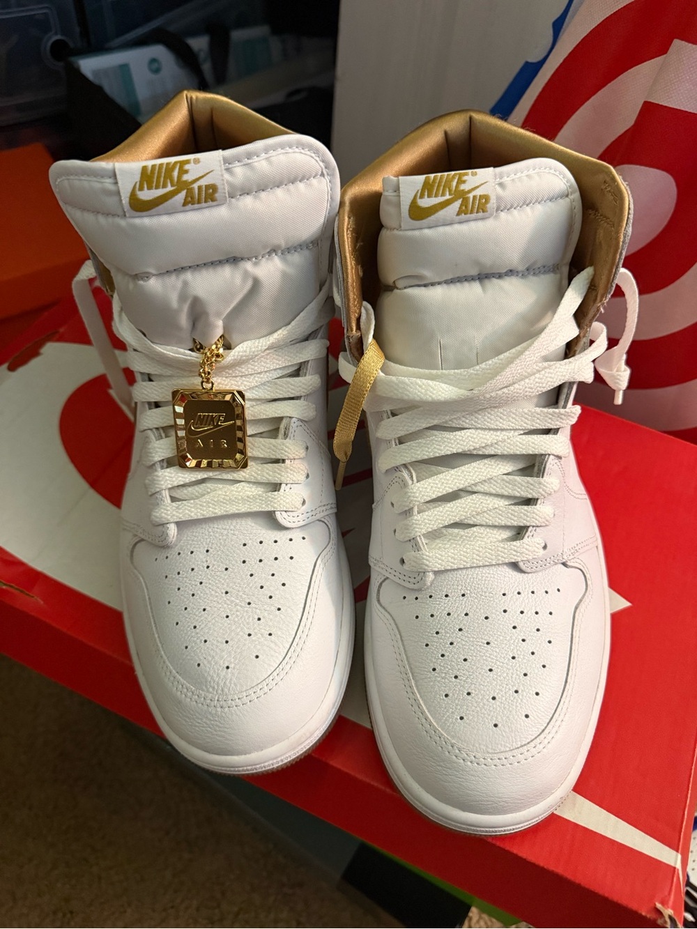 Nike Women’s High-Top Sneakers in White and Gold